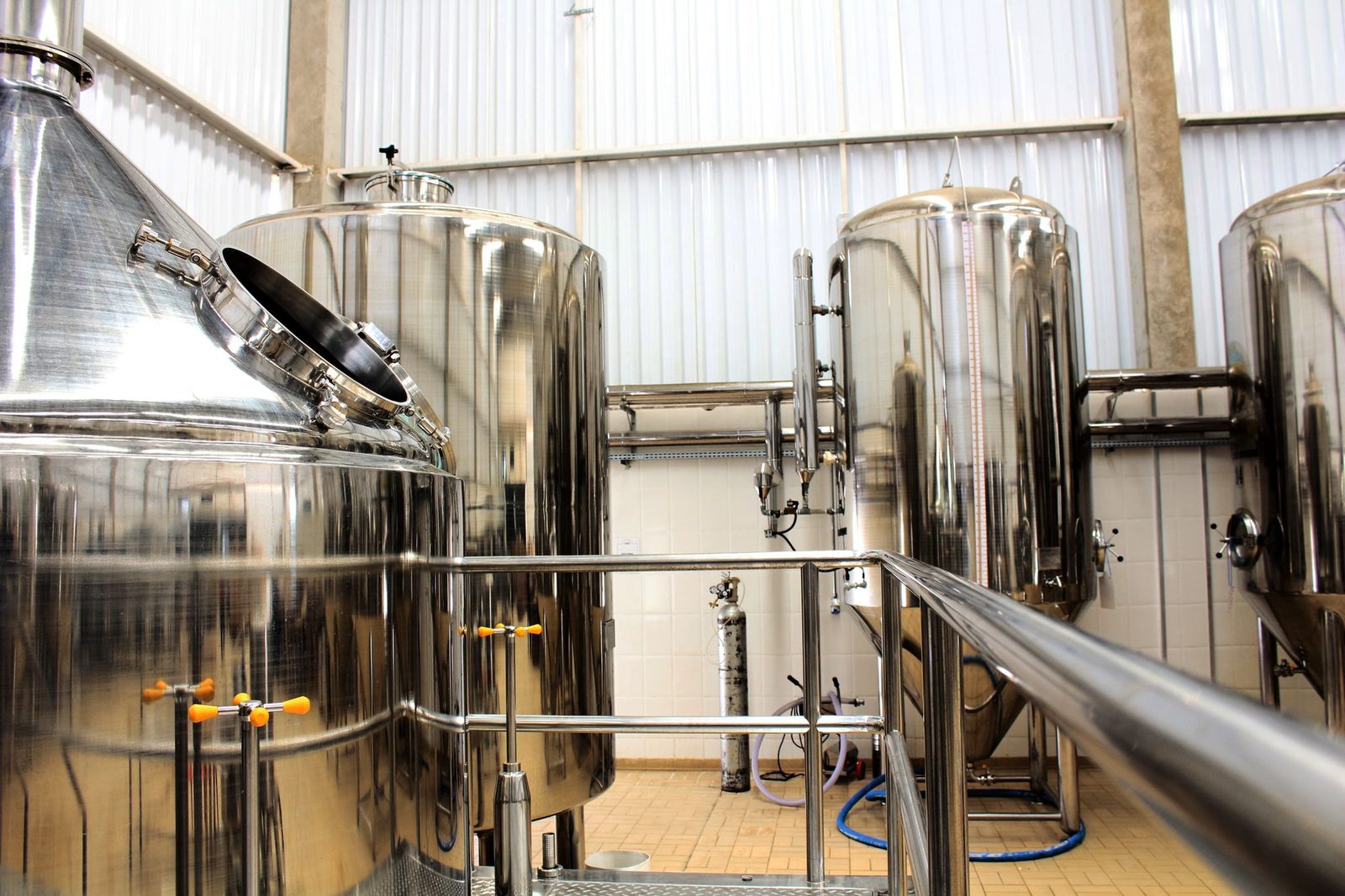 Brewhouse with stainless-steel kettles and tanks